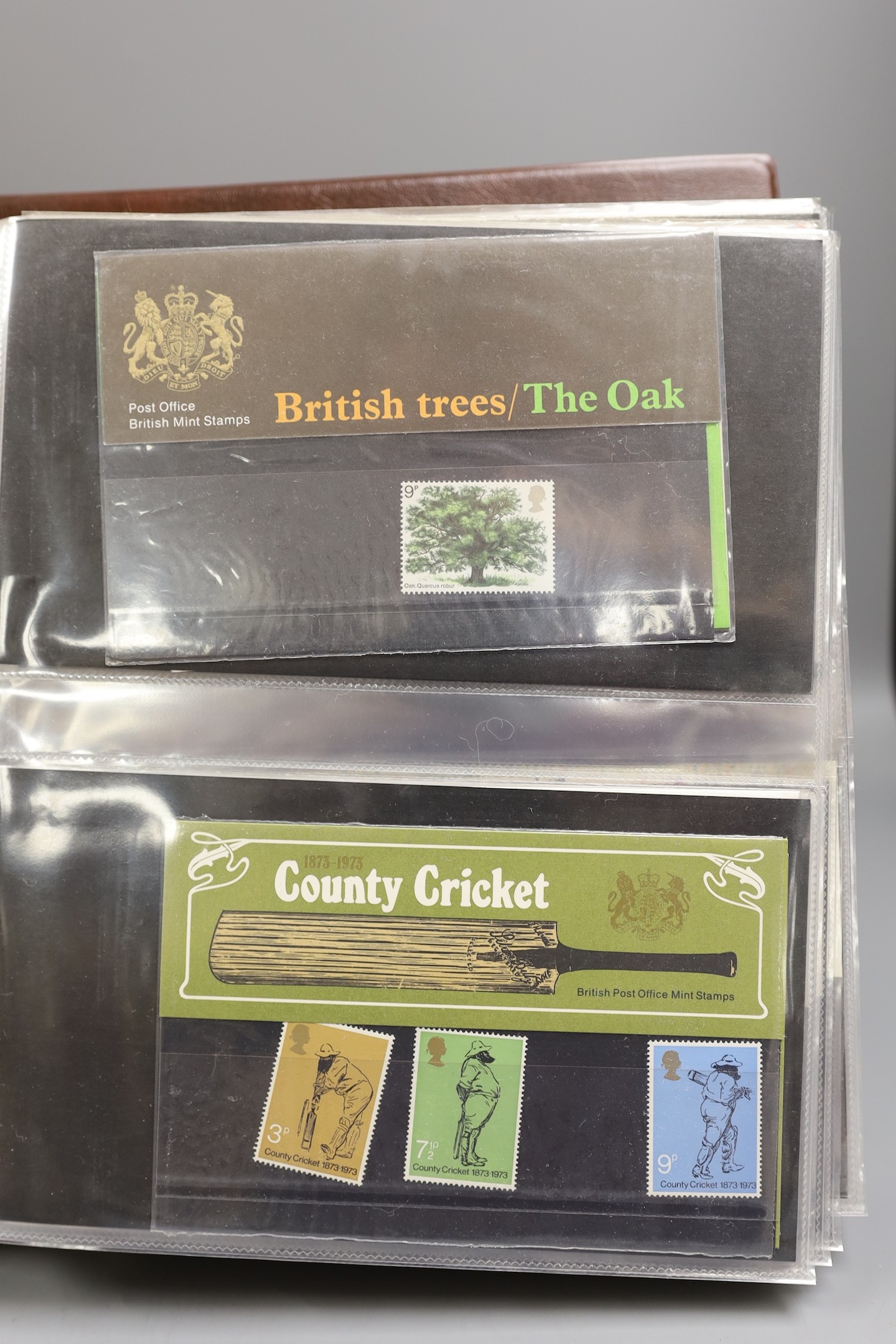 Four albums of Royal Mail and Post Office First Day Covers and other QEII stamps and covers